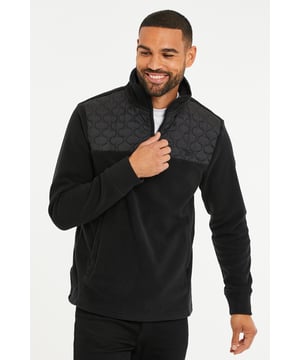 This quarter zip, microfleece top from the Threadbare Outdoor range features stylish quilting on the upper chest, two side pockets and has a very comfortable feel. This top is ideal for layering and has the threadbare signature logo on the chest.