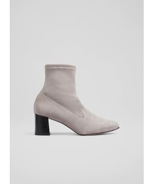 A stretch suede boot has become an LKB signature style, and our new Amira ankle boots are available in black, navy and grey, offering more choice to your winter wardrobe. Crafted in Spain from velvety-soft and stretchy grey suede, these pull-on boots have a square toe, centre seam detail and a 60mm stacked block heel. Wear them with skirts and dresses, or underneath tailoring and denim thanks to their slim-line cut.