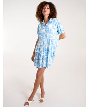 Soft and light mini smock shirt dress with a lovely summer print.