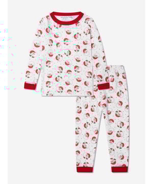 Introducing the Kids Winking Santa Long Pyjamas in Red by Magnolia Baby - a whimsical blend of comfort and style in unisex wear! Key features include:  Unique Design: Boasting a playful winking Santa print, adding a charming twist to your child's sleepwear collection.  Premium Comfort: Crafted from top-tier materials, promising ultimate comfort and relaxation for your child's sound sleep.  Versatile Addition: A perfect blend of style and comfort for your unisex wardrobe.Let your child sleep in comfort while radiating style with our Winking Santa Long Pyjamas. Order now!