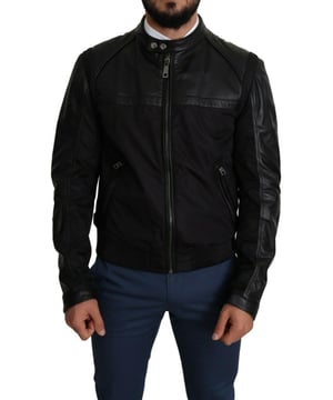 Stunning Dolce & Gabbana Black Bomber Jacket
  Leather details on shoulders and sleeves
  Color: Black
  Full zipper closure
  Logo details
  Made in Italy
  Material: 60% Nylon 40% Leather
  Lining: 90% Nylon 10% Leather
Material: 60% Nylon 40% Leather