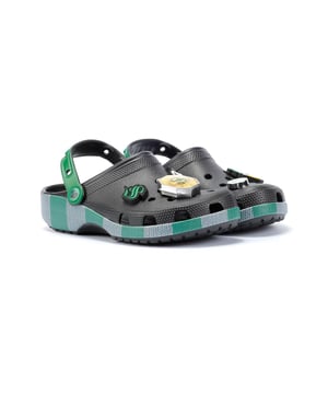 Inspired by Harry Potter’s Slytherin House scarf in green and grey, these Classic Clogs are lightweight, water-friendly, and buoyant. Featuring breathable ventilation ports and pivoting heel straps for a secure fit, they're perfect for fans seeking style and comfort. Customisable exclusive Slytherin-inspired Jibbitz™ charms.