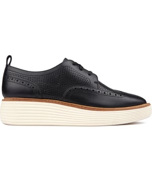Cole Haan Took An Iconic Prep Silhouette And Gave It A Playful Spin With The All-new Øriginalgrand Platform Wingtip Oxford. This Classic Style Is Crafted In Leather With Perforated Brogue Detailing To Deliver Breathability And Style, While The Platform Wedge Outsole Features The Ch Patented Flowerfoam, Designed With A Minimum Of 25% Naturally Derived Or Recycled Content By Weight. Versatile, Bringing Your Heritage Style To New Heights.