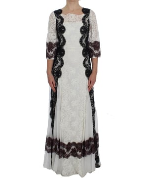 Merk: Dolce & Gabbana  
Stijl: Volledige lengte Maxi  
Kleur: Wit, zwart en bruin  
Rits aan de achterkant  
Zijde stretch binnenvoering  
Logo-details  
Gemaakt in Italië  
Materiaal: 60% Zijde, 16% Rayon, 8% Katoen, 16% Nylon  
Voering: 76% Zijde, 4% Elastaan, 4% Nylon, 16% Katoen  