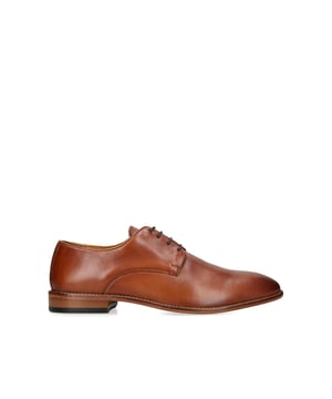 The KG Kurt Geiger Reuben is crafted from a tan leather for breathability and comfort when worn over time. The front laces up with blind eyelets.