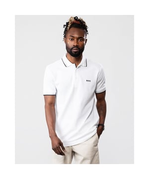 A signature polo shirt by BOSS Menswear, cut to a regular fit. Featuring contrast tipping and a logo at the left chest, this short-sleeved polo shirt is designed in cotton piqué and detailed with further BOSS branding at the undercollar.
Regular fit. Flat-knit collar. Number of buttons: 3. Short sleeves. Flat-knit cuffs. Standard length. 100% Cotton.
50469055
Model is 5"8 and wears size M