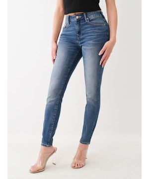The Jennie Mid Rise Curvy Skinny Jean is made to accentuate your shape. Crafted from stretch denim, this pair of skinny jeans features a mid-rise waist, single needle stitching, belt loops, and whiskering. Finished with five pocket construction and back horseshoe detailing. 