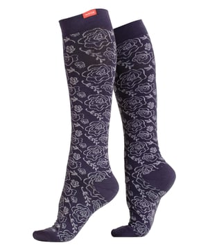 Energize your legs! Using integrally-knit graduated compression, these compression socks apply therapeutic pressure that starts at the ankle and gradually eases above. It’s this external pressure that energizes your legs and Reduces Swelling. These socks have a 20-30 mmHg compression level that is ideal for all-day, everyday wear, sitting or standing for long periods. High-quality premium merino wool throughout the sock allows for sustained compression throughout the day. Alleviate achiness & heaviness by squeezing the legs from the bottom up, our legwear can help increase circulation of freshly oxygenated blood back to your legs. These are made for people with circulation problems and also ideal for flight travel, pregnancy, exercising, when sitting or standing for long periods of time and even during visits to hospital. These socks are specially designed to energise legs, reduce swelling, alleviate achiness & heaviness and to aid in muscular recovery. Made with high-grade Australian Merino wool and a 200-needle count for flexibility and comfort which contours leg and heel for superior fit. These socks are comfortable and breathable with graduated compression from ankle to calf with a contoured leg and heel for a great fit. The flexible toe pocket doesn’t squeeze the toes! Tested & Trusted: Based out of Missoula, Montana, VIM & VIGR is dedicated to creating products that provide you with everyday relief. VIM & VIGR graduated compression legwear was developed in partnership with vascular surgeons and vein clinics and all products are listed with the Food and Drug Administration (FDA). These compression socks are available in Vintage Purple and 3 sizes: Small/Medium, Medium/Large and Large/X-Large. They’re made out of 45% Nylon, 40% Merino Wool, 15% Spandex (Latex-free).
