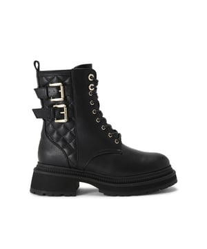 The KG Kurt Geiger Tabitha ankle boot is a combat style boot in black. There are two gold buckles at the side of the quilted ankle. The front laces up with gold eyelets.