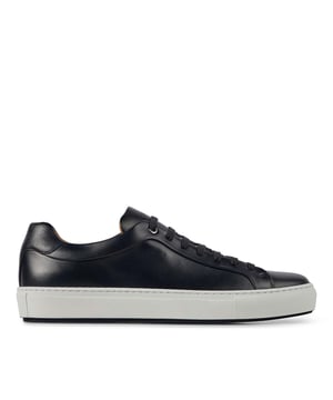 Mens BOSS Mirage Tennis Trainers in dark blue.- Made in Italy.- Clean and sophisticated calf leather upper enriched by handmade burnished finishing.- Soft and refined cognac lining.- Rubber sole with bottom color on tone with upper. - RESPONSIBLE STYLE- Ref: 50472128-401