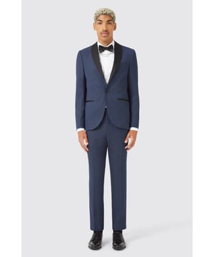 Get red carpet ready in the Neale suit, featuring an all over micro dot jacquard pattern and black satin trims, this 2 piece will turn heads at your next occasion. The Neale jacket is cut with a black satin lapel, jet pockets in contrast fabric, an outer breast welt pocket &amp; double darts to shape to your body beautifully. The matching slim fit, flat front trouser features slanted pockets with contrast piping, belt loops &amp; a rear contrast welt pocket. Pair this fancy suit with the TT x AM white satin 'Leeson' shirt, and a black bow-tie &amp; prepare to look knockout.