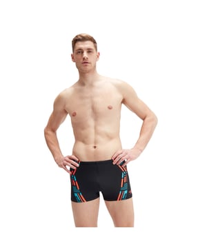 Mens Speedo Tech Print Aquashorts in black orange.- Drawstring waist.- Higher chlorine resistance than standard swimwear fabrics.- Shape Retention - fabric stretches so you can enjoy your swim without feeling restricted.- Designed with a colourful dual-panel plastisol print.- Nylon yarns in the EnduraFlex fabric are made from 100% pre-consumer waste  such as waste fabric from factories.- Ref: 800303315615Please note that returns will only be accepted if the hygiene label is still attached to the product.