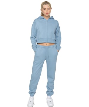 Chándal corto con capucha Enzo para mujer. Conjunto de sudadera con cremallera, capucha y pantalón tipo jogger. Sudadera con capucha corta y joggers de corte regular con diseño con puños. Forro interior cepillado en la parte posterior. Corte recortado para uso casual. Chándal esencial para estar por casa.