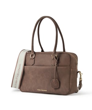 Margaret business bag Victoria Hyde, handbag, travel bag, women business bag, women work bag, office bag
Thanks to its innovative interior and minimalist design, the Margaret bag from Victoria Hyde London is the most reliable travel essential. This bag keeps your bag organized with compartments for keys, phone, pens, lipstick and headphones. There is also a toiletry bag on the back. It's spacious enough to accommodate everything you need while traveling, including your laptop. The carrying handle on the top makes it easy to grab and take with you, but you can also wear it as a shoulder bag with the shoulder strap, leaving your hands free. Also, point to the strap so you can attach it to your luggage. The Margaret bag is not only functional but also fashionable and will match all your outfit ideas. This bag is also suitable for work and as a day bag.

Material: Microfiber suede look
Dimensions: 11.5cmx23cmx32cm (WxHxD)
Lining: elastic cotton lining
Hardware Color: Light Gold