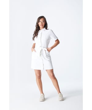 The perfect day out mini dress featuring a flawless fitted silhouette with a button and tie waist fastening. The ideal dress for a night out with friends to a holiday centrepiece, this dress will quickly become your favourite. Model is 5'6 and wears a size 8.