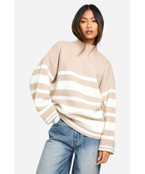 Oversized fit for ultimate comfort and style
        Striking striped pattern in contrasting hues
        Cosy high neck design for added warmth
        Long, relaxed sleeves for a laid-back look
        Versatile piece suitable for various casual occasions
    
    Embrace effortless chic with this striped oversized pullover from Boohoo. Perfect for the fashion-forward woman who values both style and comfort, this jumper is a must-have addition to your casual wardrobe. The relaxed fit and long sleeves create a slouchy, on-trend silhouette that's ideal for lazy weekends or casual outings. Style it with wide-leg jeans and trainers for a cool, off-duty look, or pair it with leggings and ankle boots for a cosy coffee date ensemble. The high neck adds an extra touch of warmth, making it perfect for those chilly autumn days. Whether you're heading to a family gathering or meeting friends for a casual lunch, this versatile pullover will keep you looking stylish and feeling comfortable all day long.