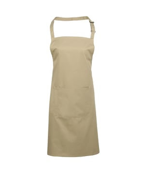 Klassiek eersteklas slabberschort met zak. Zelfgemaakte stoffen nek, zelfgemaakte stoffen banden van 90 cm lang. Schuifgesp. 60ºC Wassen. Maat één. Stof 65% Polyester, 35% Katoenen Twill Gewicht 195gsm Afmetingen Breedte 72cm, Lengte 86cm.