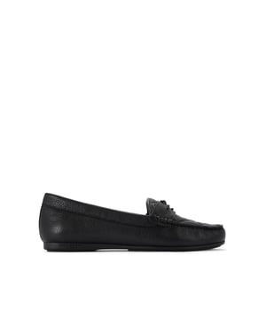 The Kurt Geiger Greenwich Moccasin slip-on loafer features a black leather upper with overstitch quilt detail on the toe. There is black branding on the front alongside micro eagle head.