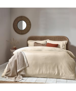 Inspired by timeless classic fabrics, the Lark duvet cover set is made from ultra-soft double-layer muslin cotton fabric. Available in a range of pastel tones, this bedding is complete with a wooden button closure. The cosy crinkle texture is perfect for bringing a relaxed, stylish feel to your bedroom. Cool and breathable in the summer months and snuggly and warm in the winter, muslin is used on both sides for an understated yet modern look. This product is certified by OEKO-TEX®, showing it has been sustainably made.