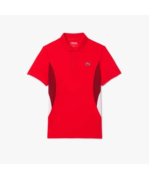 Lacoste Tennis x Novak Djokovic Ultra-Dry Polo Shirt.- Recycled polyester made from manufacturing offcuts.- Regular fit, straight cut.- Contrast sides.- Tested by tennis players.- Silicone crocodile on chest. Material: 100% Polyester. Ref: DH7330F8M.
