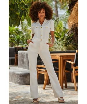 We're obsessed Sunshine-ready white denim Made with the perfect amount of stretch and softness Framed by pretty puff sleeves Cinched waist, kick-flare cut - it's made to flatter We're styling it with gold heels Inside leg to fit: Short 29" | Regular 31" | Long 33"