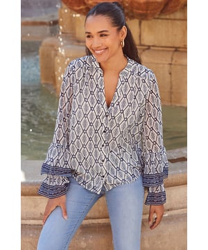 Made to throw on and go
Crafted from gorgeous floaty georgette fabric
Comfy but chic relaxed fit
You'll love the statement fluted sleeves
Add office polish with tailored trousers
We love it with white denim in summer
