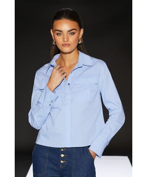 Cropped boxy silhouette for a contemporary edge
        Utility-inspired design with functional chest pockets
        Crisp poplin fabric for a polished look
        Versatile collared neckline
        Part of the exclusive RUNWAY 1.8.1.8 collection
    
    Embrace effortless chic with this Runway 1.8.1.8 Stripe Poplin Cropped Boxy Utility Shirt. The cropped length and boxy fit create a modern silhouette that's perfect for the fashion-forward woman. Style this versatile piece for a range of casual occasions - pair it with high-waisted jeans and trainers for a relaxed weekend look, or tuck it into a midi skirt with ankle boots for a smart-casual ensemble. The utility-inspired design, complete with practical chest pockets, adds a touch of functionality to your wardrobe. Whether you're heading to a family gathering or meeting friends for brunch, this shirt will keep you looking stylish and feeling confident. The crisp poplin fabric ensures a neat appearance throughout the day, making it an ideal choice for those who appreciate both comfort and style in their daywear.