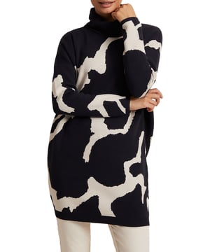 Discover effortless style with the Stefani Tunic Dress in a chic animal print, perfect for any casual outing.