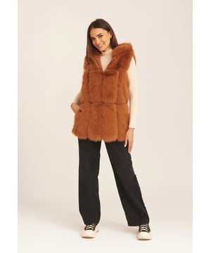 Add extra warmness this season with our gilet made from a soft faux-fur and also designed with a hooded neckline, this sleeveless gilet design will never go out of fashion. You can glam up over fine knits on chilly days for an extra layer of warmth and style.