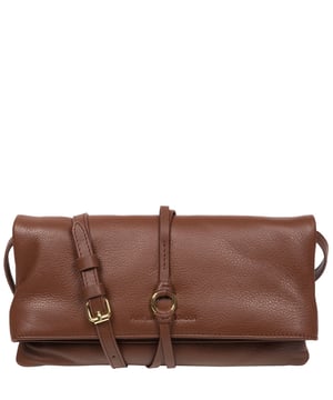 The 'Selene' cross body clutch bag from the Pure Luxuries Marylebone Collection is handcrafted from high-quality, genuine Nappa leather with a natural super-soft touch. The fold-over top secured by two magnetic press studs, opens to reveal a zipped main compartment and a slip pocket. The interior is lined with 100% cotton and includes two slip pockets to help maintain an organised bag. Comes with a matching and adjustable slim leather strap, with a maximum drop length of 65cm. The strap is also removable, transforming the bag into a clutch bag. Features gold-coloured metal fittings and zip. The Pure Luxuries logo is embossed for an effortless and sophisticated finishing touch.