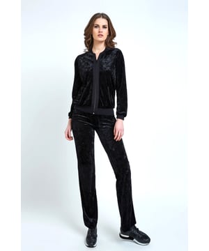 Pantalones rectos de terciopelo con cintura elástica de Conquista Fashion en tejido sostenible de punto elástico. Nuestra modelo mide 176 cm y lleva la talla 36/S. Fabricado en Grecia.