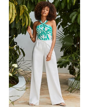Your new go-to trouserCrafted from a super soft and comfy fabricBreezy wide-leg styleElasticated waist for maximum comfortDress them up with heels and a nice topStyle with a vest and sandals on sunny daysInside leg to fit: Short 29" | Regular 31" | Long 33"