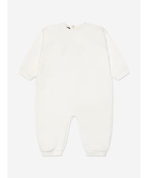 Introducing the exquisite Baby Medusa Logo Romper in White by Versace, crafted for elegance and comfort for babies of all genders. This luxurious piece is a staple for the AW2024 collection. Key features include:‚ Iconic Medusa Logo: Stylishly adorned with Versace's signature emblem, ensuring a chic, upscale look.‚ Premium Italian Quality: Meticulously made in Italy with superior fabrics for durability and softness.‚ Versatile Unisex Design: Perfect for baby boys and girls, blending timeless style with modern simplicity.‚ Pure White Elegance: A pristine white colour enhances its sophisticated appeal, making it a versatile addition to any young wardrobe.Elevate your child's fashion ensemble with this standout Versace romper. Perfect for any occasion!