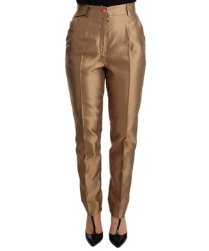 Marca: Dolce & Gabbana  
Condición: Nuevo con etiquetas  
Estilo: Pantalones ajustados  
Calce: Regular  
Material: 100% Seda  
Color: Dorado metálico  
Cierre: Cremallera  
Detalles: Detalles de logo  
Origen: Hecho en Italia  
Material: 100% Seda  