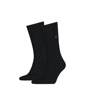 
Tommy Hilfiger Sokken 2-pack is perfect voor een subtiele stijl. Deze effen zwarte sokken geven een klassieke touch aan elke outfit. Er zitten 2 stuks in een verpakking. Tommy Hilfiger staat voor tijdloze elegantie en hoogwaardige kwaliteit. - Over het merk: De Amerikaanse college-uitstraling is het meest kenmerkend voor Tommy Hilfiger. De klassieke maar moderne kledingstukken van het merk zijn sportief, casual en gekleed!
