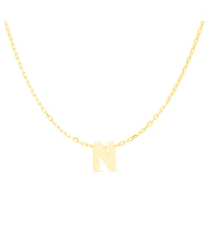 Collar Alphabet Plata de Ley 925  acabado en oro amarillo de 18 Quilates. Además de lograr estilismos para trotar por el mundo nuestros diseños marcan la diferencia y consiguen que esa diferencia sea radical. Diseños realizados cuidadosamente a mano con materiales y circonitas brillantes de primera calidad dan vida a un Alfabeto de diferentes tamaños. Su exotismo: iniciales sobre Plata de Ley 925, solo es comparable con su recato. Intuitiva, ponderada acierta cada vez que te lo pones y representa como pocas el carácter urbano más cosmopolita: BE AUTHENTIC (NOT) UNIQUE.