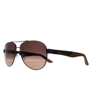 Las gafas de sol Salvatore Ferragamo Aviator Gradient Marrón Gris Rutenio Oscuro Mate para hombre SF275S destilan lujo y elegancia, encarnando la refinada artesanía por la que es conocida la marca. Estas gafas de sol cuentan con una montura de aviador atrevida y sofisticada que combina a la perfección un diseño moderno con un atractivo atemporal. Fabricadas en metal de alta calidad, las SF275S ofrecen durabilidad y comodidad, mientras que las lentes proporcionan una magnífica protección UV para proteger sus ojos de los rayos dañinos. Los sutiles detalles del logotipo de Ferragamo en las patillas añaden un toque de discreta opulencia, convirtiendo estas gafas de sol en el accesorio perfecto para quienes buscan un estilo vanguardista y una funcionalidad de primera.