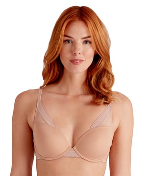 Our Naturals collection is made with a lightweight and breathable microfibre. An everyday essential, boasting wearable designs that make you look and feel great. Creme brulee is a delicate and creamy shade, perfect to pair with light coloured clothing. Our high apex moulded cup offers light padding and underwire to enhance your shape. This elegant t-shirt bra has mesh panel detailing and picot trims for a delicate and feminine feel.
