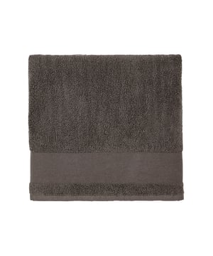Materiaal: 100% gekamde katoenen badstof. Een gladde strook van 6 cm voor decoratie. Hangende lus. Afmetingen: 50 x 100cm.