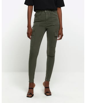High waisted, Denim fabric, Skinny fit, Cargo design, Utility pockets, Belt loops, Classic 5 pockets, Button and zip fastening
