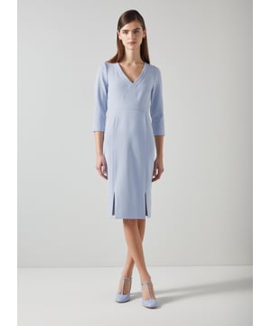 Beautifully tailored, totally timeless and kind to our planet, the new Sky shift is designed with dressy days in mind, because we all need that one dress that can do it all. Thoughtfully-made in Europe from a pale blue LENZING™ ECOVERO™ viscose* blend crepe, it's a shapely shift with a deep V-neck, three-quarter sleeves with flared cuffs, a nipped waist and a pencil skirt with slit detail. Wear it with courts and a tote for the office or with heels and a clutch for the fancier moments in your spring diary. 

*More about the fabric
LENZING™ ECOVERO™ viscose uses up to 50% less emissions and 50% less water than standard viscose. This fibre relies on wood pulp, and is crafted from sustaibly maged tree species such as beech, spruce and eucalyptus.