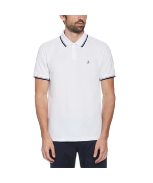 Every guy needs a solid polo shirt in their wardrobe and this Original Penguin one has you covered for style and comfort. Made from 100% organic cotton  it's soft and breathable and pique fabrication creates a subtle texture you can see and feel. A tipped collar pulls the look together and Pete offers his stamp of approval on the chest. Pair it up with jeans  chinos  or shorts  it's a versatile short sleeve top perfect for hanging with your buddies or going out for date night
