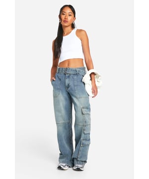 In a high rise and slimming silhouette, the straight leg jean is your new 'wear them everyday' jean. Paired with heels or trainers, these all-rounder jeans are perfect for a classic and cleaner look that feels new. Made from rigid non-stretch denim, straight jeans are durable and flattering - we're obsessing over them worn with oversized hoodies and statement jackets. Featuring new distressing and split hems, as well as the iconic high waisted straight leg jean, we're bringing '90s vintage vibes with this denim staple. Style: Cargo JeanFabric: Cotton