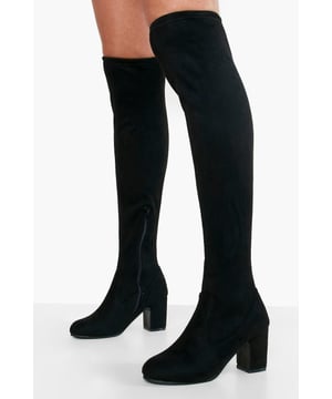 Over-the-knee design for a bold, statement look
        Wide fit for enhanced comfort and versatility
        Block heel measuring between 5 and 6.5cm for stability and style
        Stretch material for easy wear and snug fit
        Synthetic suede upper for a luxe appearance
    
    Step out in confidence with these striking over-the-knee boots. Perfect for those seeking both comfort and style, the wide fit design ensures a comfortable wear for various leg shapes. The mid-height block heel, measuring between 5 and 6.5cm, offers the ideal balance of elevation and walkability, making these boots suitable for extended wear. Pair them with a mini skirt and oversized jumper for a chic daytime look, or style with a bodycon dress for a night out on the town. The versatile nature of these boots allows for endless styling possibilities, from casual outings to more dressed-up occasions. The stretch material ensures these boots will hug your legs comfortably, while the synthetic suede upper adds a touch of sophistication to any ensemble. Whether you're heading to a family gathering or meeting friends for coffee, these boots will keep you looking fashionable and feeling fabulous.