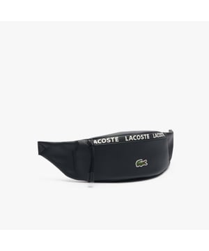 Coated Canvas LCST Logo Stripe Banana Bag. Dimensions: L13.8 x H4.1 x D2.8 in.- L35 x H10.5 x D7 cm.- Printed, coated canvas outer.- Adjustable waist strap: 90cm - 48cm.- 35.4 - 18.9 in.- 1 zipped back pocket.- Printed crocodile.- Logo stripe.