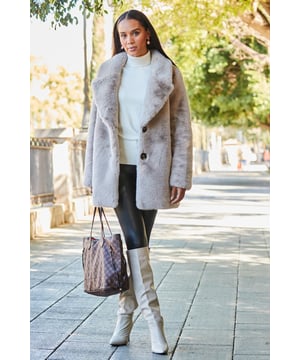 Like wearing your duvet. But chicer
Made from the softest, snuggliest faux fur
Flattering single-breasted fit
Fully-lined for extra warmth
Throw it over a party look for old-school glamour
Style with a jumper, jeans and boots for winter walks