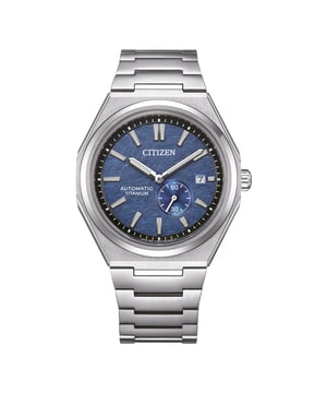 This Citizen  Analogue Watch for Men is the perfect timepiece to wear or to gift. It's Silver 41 mm Round case combined with the comfortable Silver Titanium watch band will ensure you enjoy this stunning timepiece without any compromise. Operated by a high quality Automatic movement and water resistant to 10 bars, your watch will keep ticking. This watch has an automatic watch movement ( recharged by any movement with your wrist; never needs a battery)  This Analogue watch has a calendar function: Date , Luminous Hands and Luminous Numbers High quality 21 cm length and 23 mm width Silver Titanium strap with a Fold over with push button clasp Case diameter: 41 mm,case thickness: 11 mm, case colour: Silver and dial colour: Blue