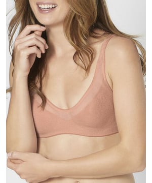Dieser innovative Soft-BH aus der Oxygene Infinite-Serie ist atmungsaktiv, luftig und unglaublich leicht. Ein superweiches Innenfutter kombiniert mit einem zweilagigen elastischen Abstandsmaterial fühlt sich leicht an und sorgt für idealen Komfort.

 Einzelheiten:

 - Sehr atmungsaktives Material, gefüllt mit Luftmikrokapseln.
 - Drahtloser BH.
 - Flexibler Stoff, der sich dem Körper anpasst.
 - Unglaublich zarte Kanten der Träger
 - Innovativer Klickverschluss mit 4 Positionen, der die Verwendung erleichtert.

 Innovativer und moderner BH ohne Bügel, der sich in alle Richtungen dehnt und absolute Bewegungsfreiheit garantiert.
 Komposition: 59 % Polyester, 29 % Polyamid, 12 % Elastan,
 Pflege:
- Handwäsche nur.
 - Verwenden Sie ein mildes Reinigungsmittel.
 - Benutzen Sie keinen Trockner.
 - Kein Bügeln.