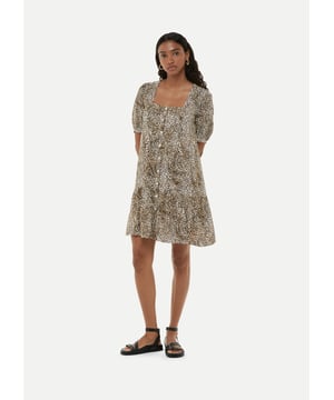 Experience elegance with the Ink Spot Midi Dress - perfect for any special occasion.