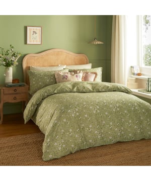 Transform your bedroom into a serene retreat with the Bronte Floral Duvet Cover Set. Crafted from 100% cotton and featuring a 144-thread count, this duvet cover combines comfort with timeless elegance. The classic English garden ditsy print showcases delicate lilac forget-me-nots and subtle foliage, offering a refined touch that speaks to lovers of nature and understated beauty. The same exquisite design graces both sides, allowing it to stand alone as a statement piece. With Bronte, experience the perfect blend of sophistication and natural allure that invites tranquillity and style into your living space. 200 x 200cm